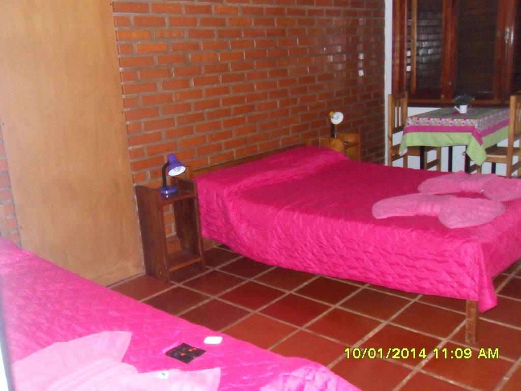 Hostel Y Posada Colibri 푸에르토이과수 객실 사진